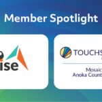 Graphic reads, "Member Spotlight". Rise and Touchstone logos centered in the image on top of a green to blue gradient.